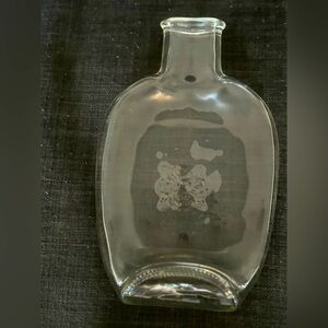 Four Roses “smashed” bourbon bottle